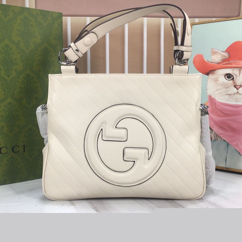 G*u*i top handle bags
